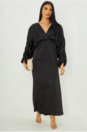 Robe manche bouffante satinée noire