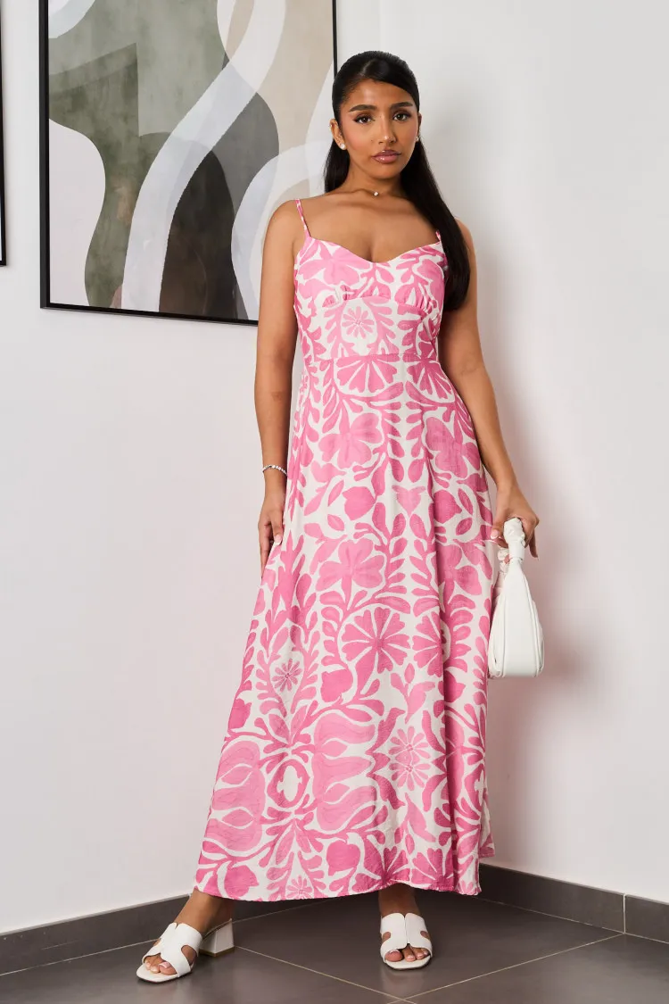 Robe rose à motif fleuri